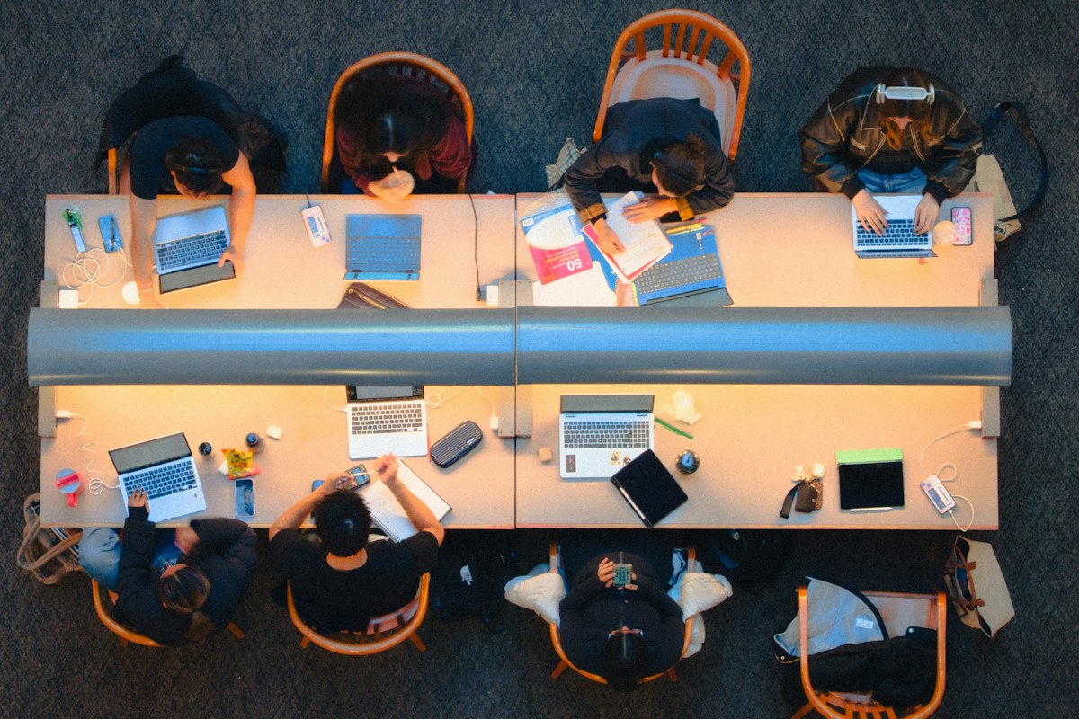 Students studying together at a library table